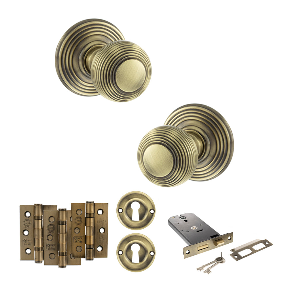 Quality image of Old English Ripon Door Knob Pack (Lock Set - Horizontal Sashlock, 3" Fire Rated Hinges x3) - Antique Brass | Sku. adpoe50rmkab69 | available from Trade Door Handles.
