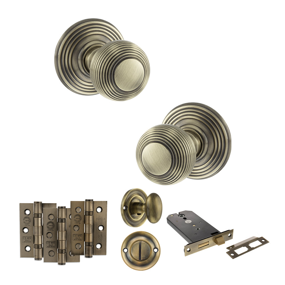 Quality image of Old English Ripon Door Knob Pack (Lock Set - Horizontal Bathlock, 3" Fire Rated Hinges x3) - Antique Brass | Sku. adpoe50rmkab70 | available from Trade Door Handles.