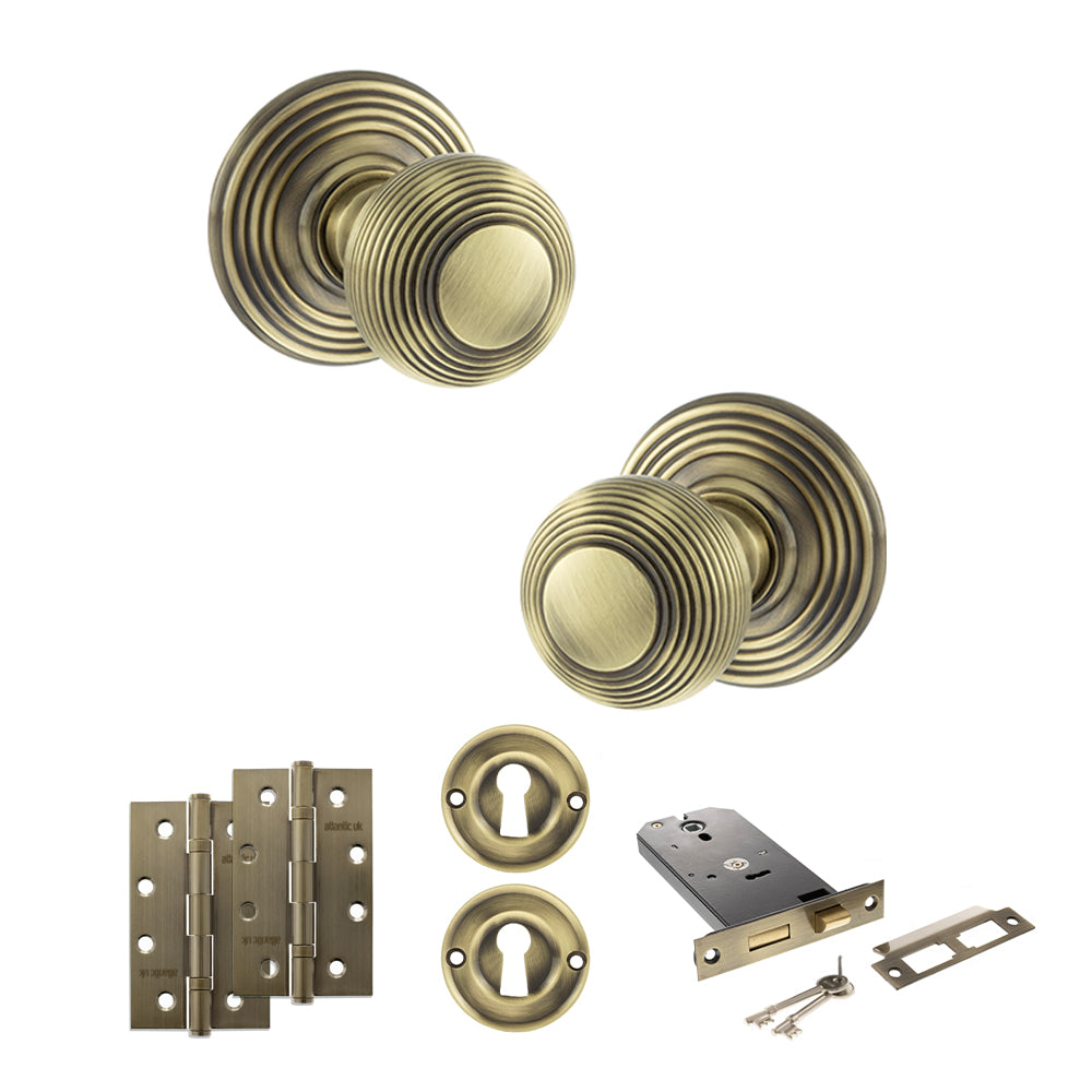 Quality image of Old English Ripon Door Knob Pack (Lock Set - Horizontal Sashlock, 4" Slim Knuckle Hinges x2) - Antique Brass | Sku. adpoe50rmkab73 | available from Trade Door Handles.