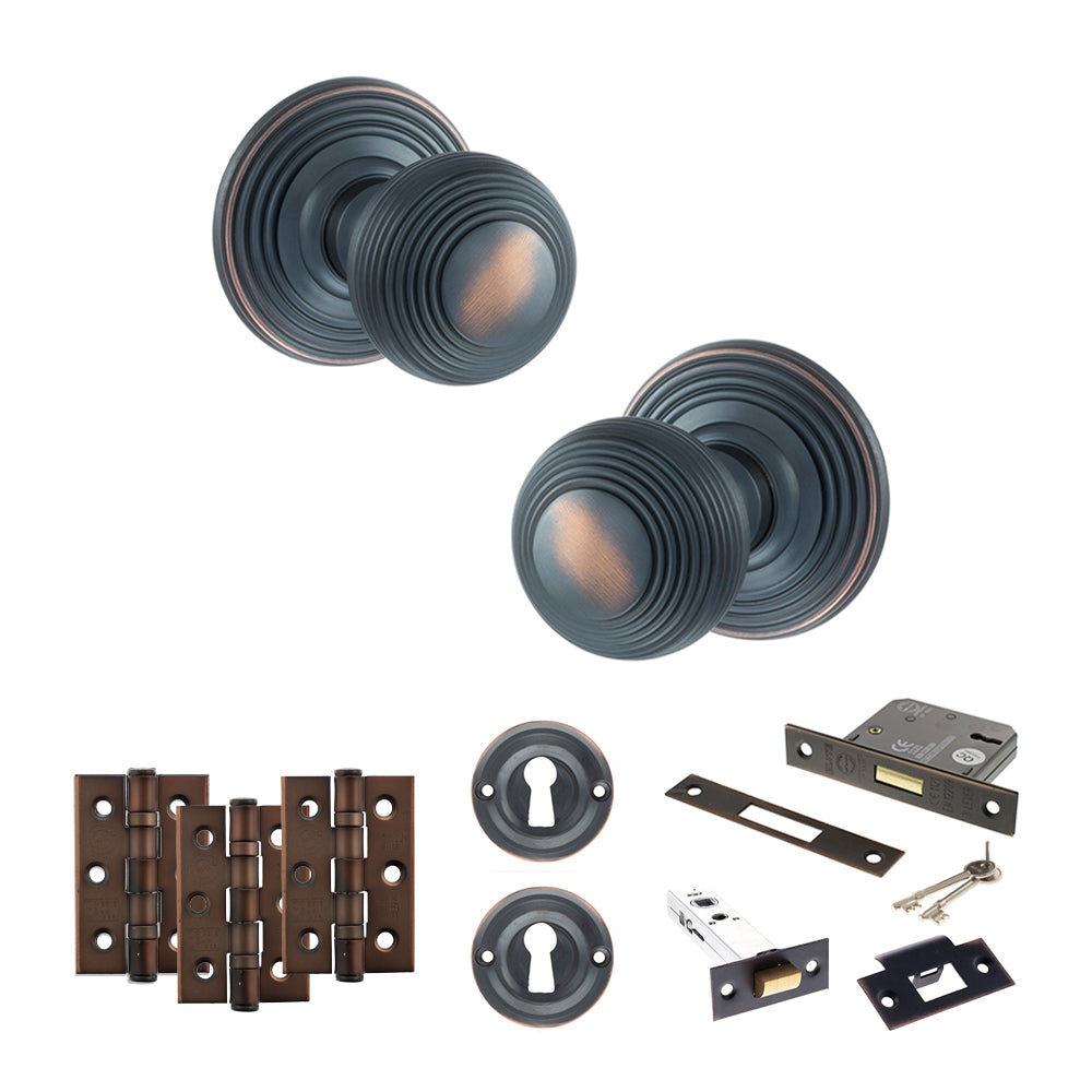 Quality image of Old English Ripon Door Knob Pack (Lock Set - 3" Latch & Deadlock, 3" Fire Rated Hinges x3) - Antique Copper | Sku. adpoe50rmkac66 | available from Trade Door Handles.