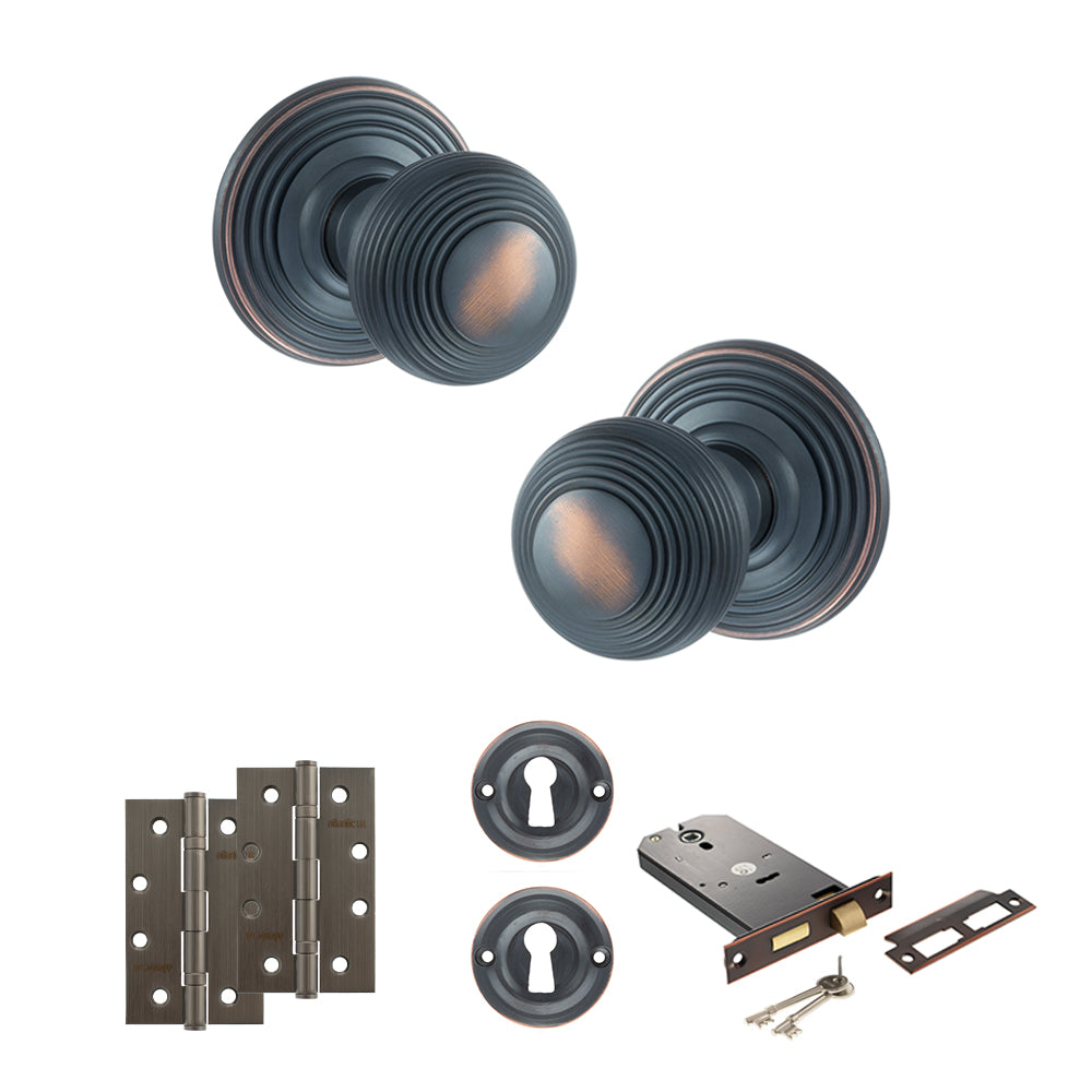 Quality image of Old English Ripon Door Knob Pack (Lock Set - Horizontal Sashlock, 4" Slim Knuckle Hinges x2) - Antique Copper | Sku. adpoe50rmkac73 | available from Trade Door Handles.