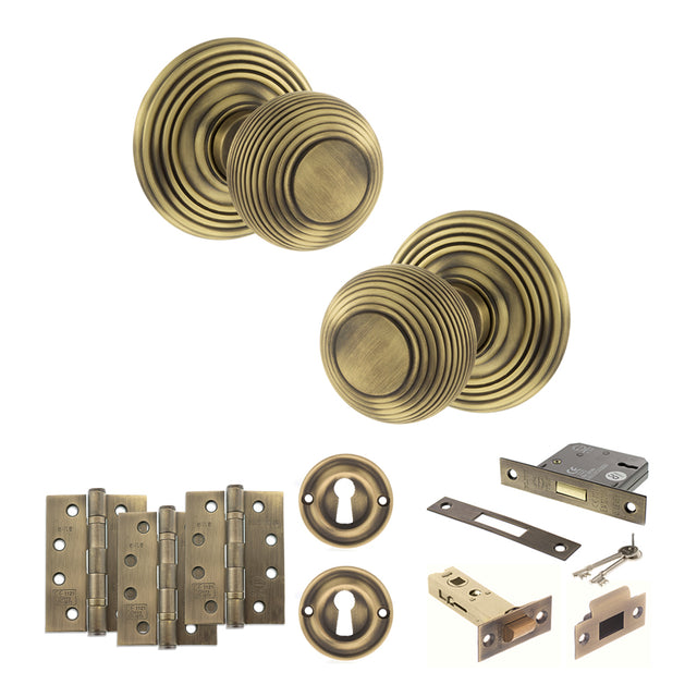 Quality image of Old English Ripon Door Knob Pack (Lock Set - 3" Latch & Deadlock, 4" Fire Rated Hinges x3) - Matt Antique Brass | Sku. adpoe50rmkmab67 | available from Trade Door Handles.