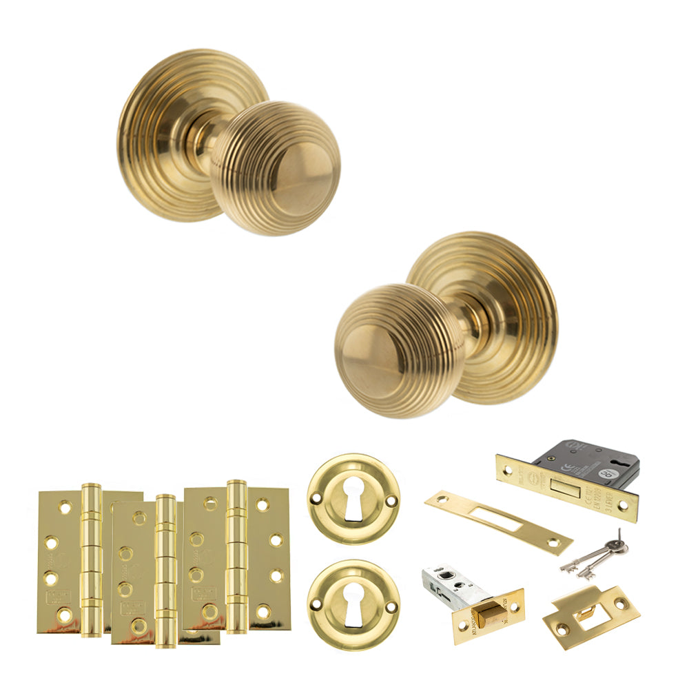 Quality image of Old English Ripon Door Knob Pack (Lock Set - 3" Latch & Deadlock, 4" Fire Rated Hinges x3) - Raw Brass | Sku. adpoe50rmkrb67 | available from Trade Door Handles.