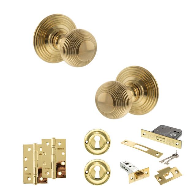 Quality image of Old English Ripon Door Knob Pack (Lock Set - 3" Latch & Deadlock, 4" Slim Knuckle Hinges x2) - Raw Brass | Sku. adpoe50rmkrb68 | available from Trade Door Handles.
