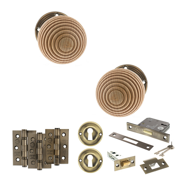 Quality image of Old English Bridlington Door Knob Pack (Lock Set - 3" Latch & Deadlock, 3" Fire Rated Hinges x3) - Antique Brass | Sku. adpoe57rmkab66 | available from Trade Door Handles.