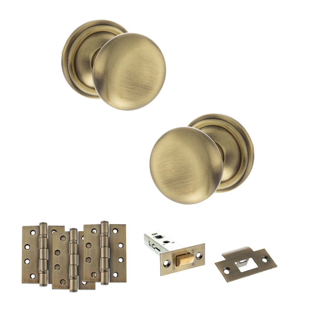Quality image of Old English Harrogate Door Knob Pack (Latch Set - 3" HD Latch, 4" Fire Rated Hinges x3) - Antique Brass | Sku. adpoe58mmkab56 | available from Trade Door Handles.