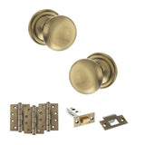 Quality image of Old English Harrogate Door Knob Pack (Latch Set - 3" HD Latch, 4" Fire Rated Hinges x3) - Antique Brass | Sku. adpoe58mmkab56 | available from Trade Door Handles.