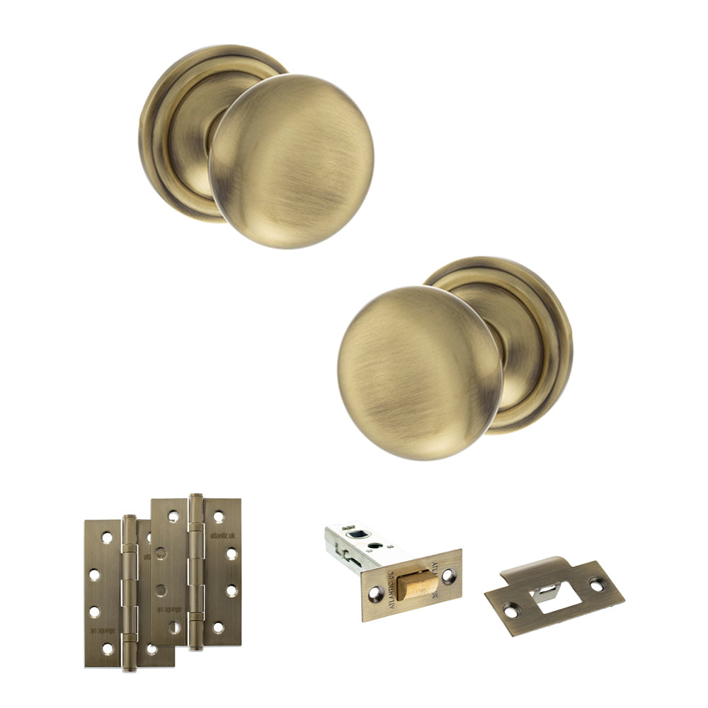 Quality image of Old English Harrogate Door Knob Pack (Latch Set - 4" HD Latch, 4" Slim Knuckle Hinges x2) - Antique Brass | Sku. adpoe58mmkab59 | available from Trade Door Handles.
