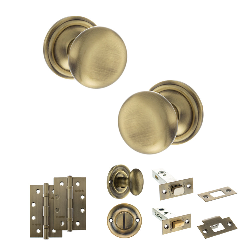 Quality image of Old English Harrogate Door Knob Pack (Bathroom Set - 3" Deadbolt, 4" Slim Knuckle Hinges x2) - Antique Brass | Sku. adpoe58mmkab64 | available from Trade Door Handles.