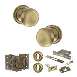 Quality image of Old English Harrogate Door Knob Pack (Lock Set - 3" Latch & Deadlock, 3" Fire Rated Hinges x3) - Antique Brass | Sku. adpoe58mmkab66 | available from Trade Door Handles.