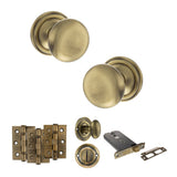 Quality image of Old English Harrogate Door Knob Pack (Lock Set - Horizontal Bathlock, 3" Fire Rated Hinges x3) - Antique Brass | Sku. adpoe58mmkab70 | available from Trade Door Handles.