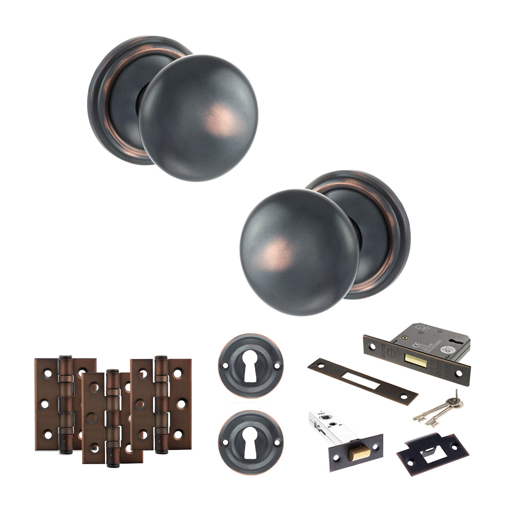 Quality image of Old English Harrogate Door Knob Pack (Lock Set - 3" Latch & Deadlock, 3" Fire Rated Hinges x3) - Antique Copper | Sku. adpoe58mmkac66 | available from Trade Door Handles.