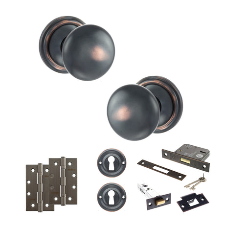 Quality image of Old English Harrogate Door Knob Pack (Lock Set - 3" Latch & Deadlock, 4" Slim Knuckle Hinges x2) - Antique Copper | Sku. adpoe58mmkac68 | available from Trade Door Handles.