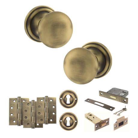 Quality image of Old English Harrogate Door Knob Pack (Lock Set - 3" Latch & Deadlock, 4" Fire Rated Hinges x3) - Matt Antique Brass | Sku. adpoe58mmkmab67 | available from Trade Door Handles.