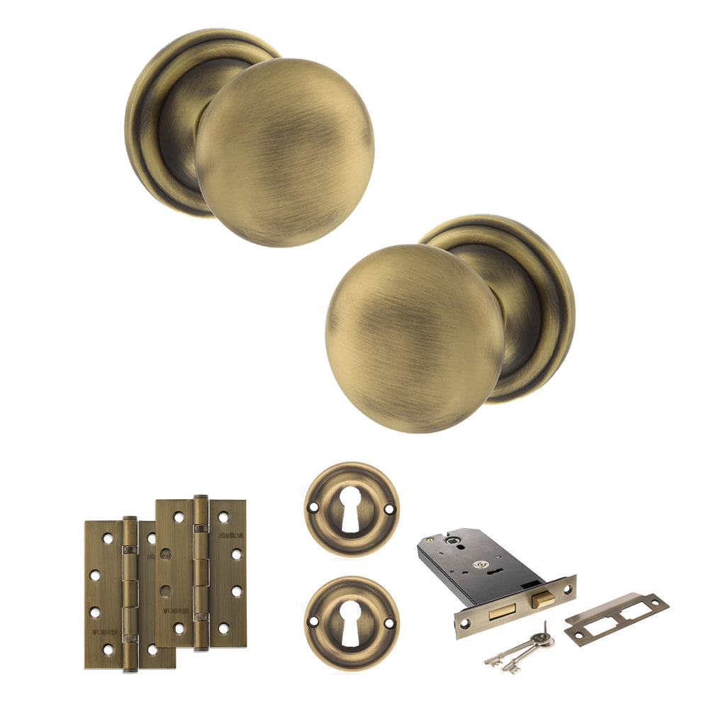 Quality image of Old English Harrogate Door Knob Pack (Lock Set - Horizontal Sashlock, 4" Slim Knuckle Hinges x2) - Matt Antique Brass | Sku. adpoe58mmkmab73 | available from Trade Door Handles.