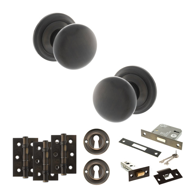 Quality image of Old English Harrogate Door Knob Pack (Lock Set - 3" Latch & Deadlock, 3" Fire Rated Hinges x3) - Urban Dark Bronze | Sku. adpoe58mmkudb66 | available from Trade Door Handles.