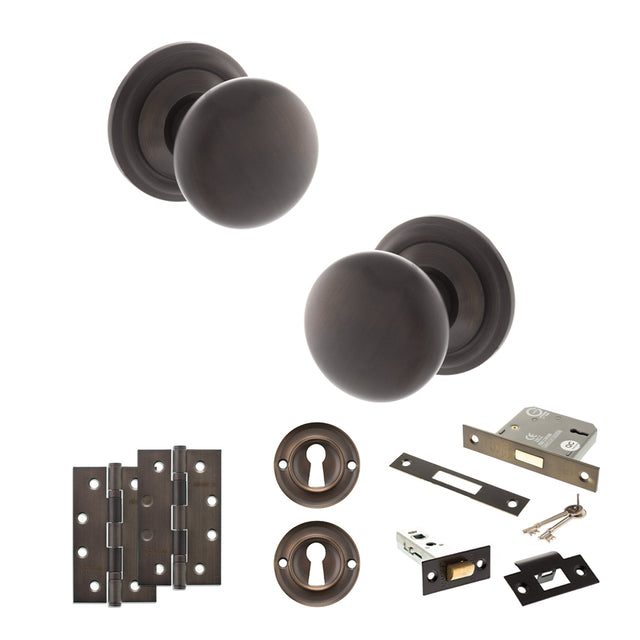 Quality image of Old English Harrogate Door Knob Pack (Lock Set - 3" Latch & Deadlock, 4" Slim Knuckle Hinges x2) - Urban Dark Bronze | Sku. adpoe58mmkudb68 | available from Trade Door Handles.