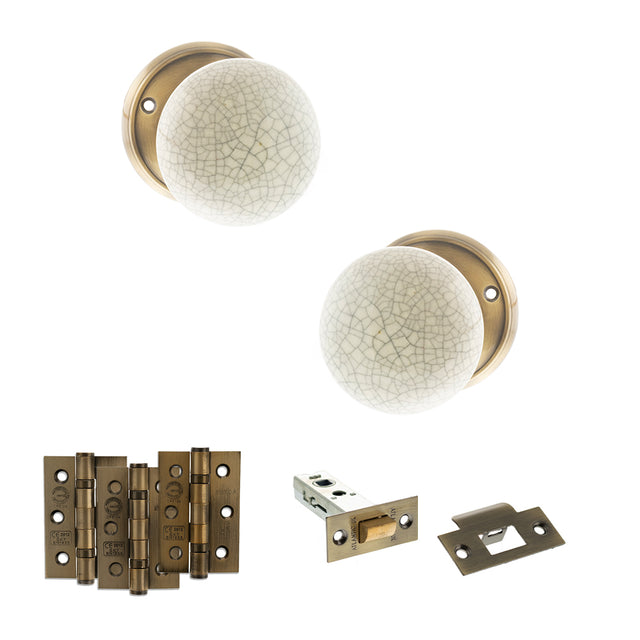 Quality image of Old English Skipton Door Knob Pack (Latch Set - 4" HD Latch, 3" Fire Rated Hinges x3) - Antique Brass | Sku. adpoe59cmkcab55 | available from Trade Door Handles.