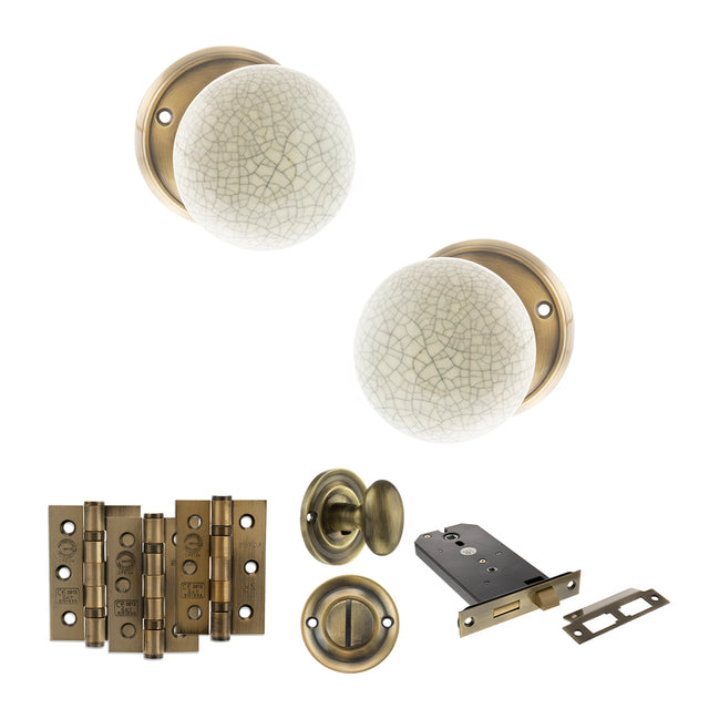 Quality image of Old English Skipton Door Knob Pack (Lock Set - Horizontal Bathlock, 3" Fire Rated Hinges x3) - Antique Brass | Sku. adpoe59cmkcab70 | available from Trade Door Handles.