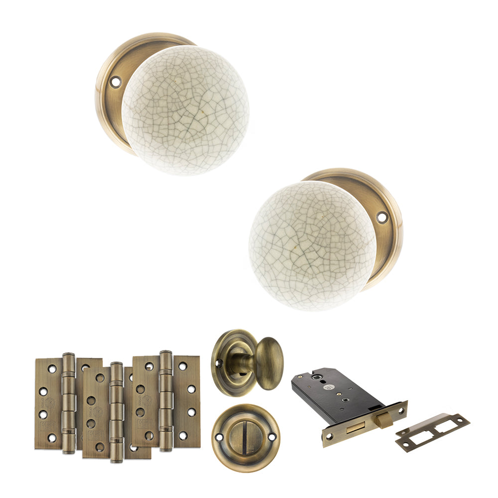 Quality image of Old English Skipton Door Knob Pack (Lock Set - Horizontal Bathlock, 4" Fire Rated Hinges x3) - Antique Brass | Sku. adpoe59cmkcab72 | available from Trade Door Handles.
