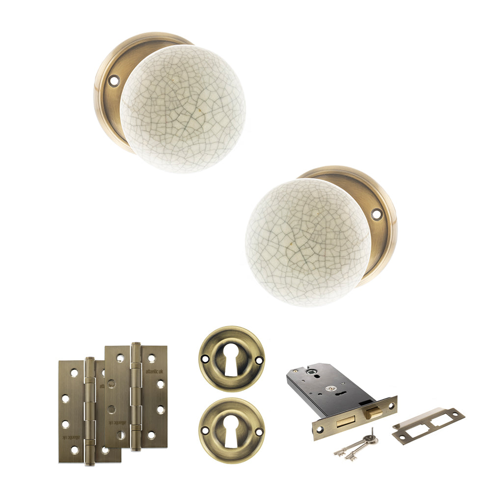Quality image of Old English Skipton Door Knob Pack (Lock Set - Horizontal Sashlock, 4" Slim Knuckle Hinges x2) - Antique Brass | Sku. adpoe59cmkcab73 | available from Trade Door Handles.