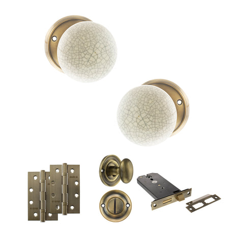 Quality image of Old English Skipton Door Knob Pack (Lock Set - Horizontal Bathlock, 4" Slim Knuckle Hinges x2) - Antique Brass | Sku. adpoe59cmkcab74 | available from Trade Door Handles.