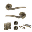 Quality image of STATUS Indiana Door Handle Pack (Bathroom Set - 3" CE Bathroom Lock, 4" Slim Knuckle Hinges x2) - Antique Brass | Sku. adps33rab13 | available from Trade Door Handles.