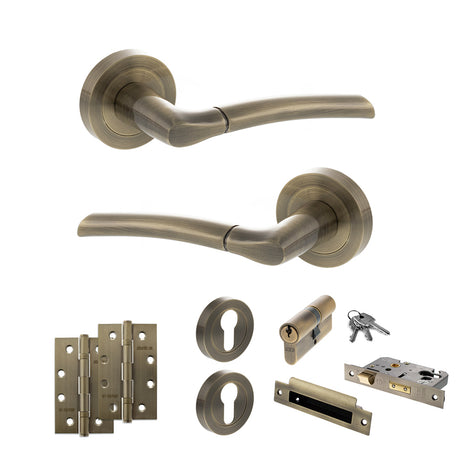 Quality image of STATUS Indiana Door Handle Pack (Euro Lock Set - 3" CE Sashlock, 4" Slim Knuckle Hinges x2) - Antique Brass | Sku. adps33rab25 | available from Trade Door Handles.