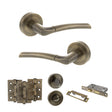 Quality image of STATUS Indiana Door Handle Pack (Bathroom Set - 2.5" CE Bathroom Lock, 3" Fire Rated Hinges x3) - Antique Brass | Sku. adps33rab8 | available from Trade Door Handles.
