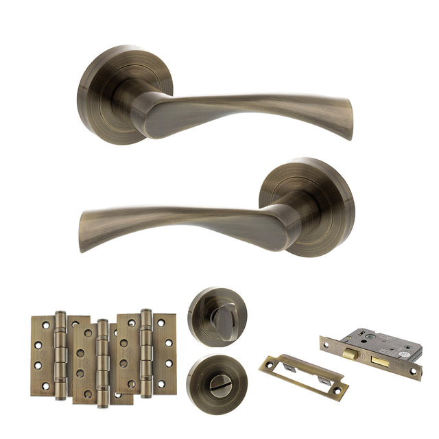 Quality image of STATUS Colorado Door Handle Pack (Bathroom Set - 3" CE Bathroom Lock, 4" Fire Rated Hinges x3) - Antique Brass | Sku. adps34rab11 | available from Trade Door Handles.