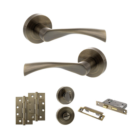 Quality image of STATUS Colorado Door Handle Pack (Bathroom Set - 2.5" CE Bathroom Lock, 4" Slim Knuckle Hinges x2) - Antique Brass | Sku. adps34rab12 | available from Trade Door Handles.