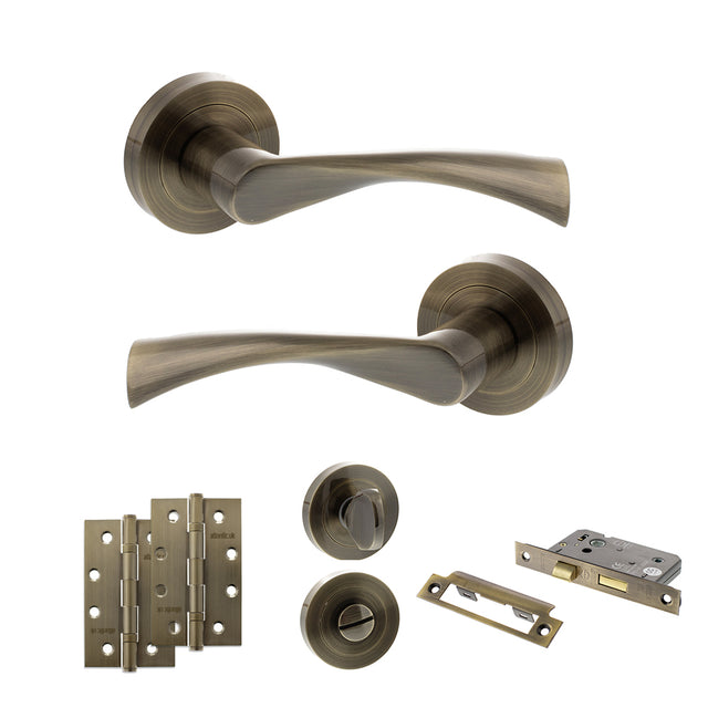 Quality image of STATUS Colorado Door Handle Pack (Bathroom Set - 2.5" CE Bathroom Lock, 4" Slim Knuckle Hinges x2) - Antique Brass | Sku. adps34rab12 | available from Trade Door Handles.