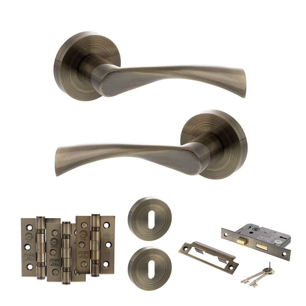 Quality image of STATUS Colorado Door Handle Pack (3 Lever Lock Set - 3" CE Sashlock, 3" Fire Rated Hinges x3) - Antique Brass | Sku. adps34rab15 | available from Trade Door Handles.