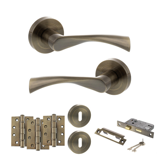 Quality image of STATUS Colorado Door Handle Pack (3 Lever Lock Set - 2.5" CE Sashlock, 4" Fire Rated Hinges x3) - Antique Brass | Sku. adps34rab16 | available from Trade Door Handles.