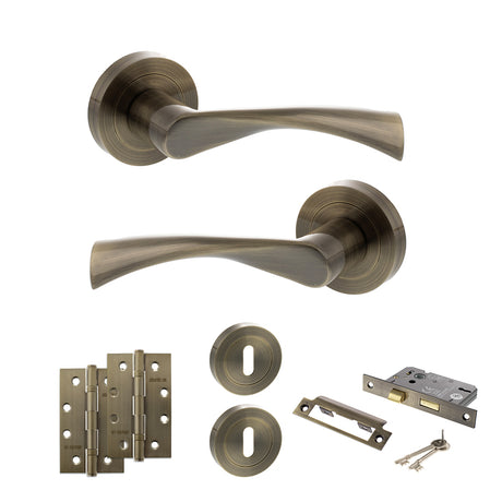 Quality image of STATUS Colorado Door Handle Pack (3 Lever Lock Set - 2.5" CE Sashlock, 4" Slim Knuckle Hinges x2) - Antique Brass | Sku. adps34rab18 | available from Trade Door Handles.