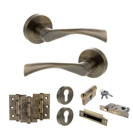 Quality image of STATUS Colorado Door Handle Pack (Euro Lock Set - 2.5" CE Sashlock, 3" Fire Rated Hinges x3) - Antique Brass | Sku. adps34rab20 | available from Trade Door Handles.