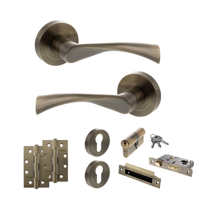 Quality image of STATUS Colorado Door Handle Pack (Euro Lock Set - 2.5" CE Sashlock, 4" Slim Knuckle Hinges x2) - Antique Brass | Sku. adps34rab24 | available from Trade Door Handles.