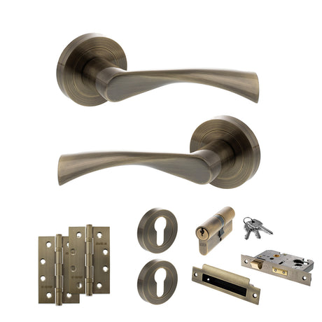 Quality image of STATUS Colorado Door Handle Pack (Euro Lock Set - 3" CE Sashlock, 4" Slim Knuckle Hinges x2) - Antique Brass | Sku. adps34rab25 | available from Trade Door Handles.