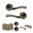 Quality image of STATUS Texas Door Handle Pack (Bathroom Set - 3" CE Bathroom Lock, 4" Fire Rated Hinges x3) - Antique Brass | Sku. adps35rab11 | available from Trade Door Handles.