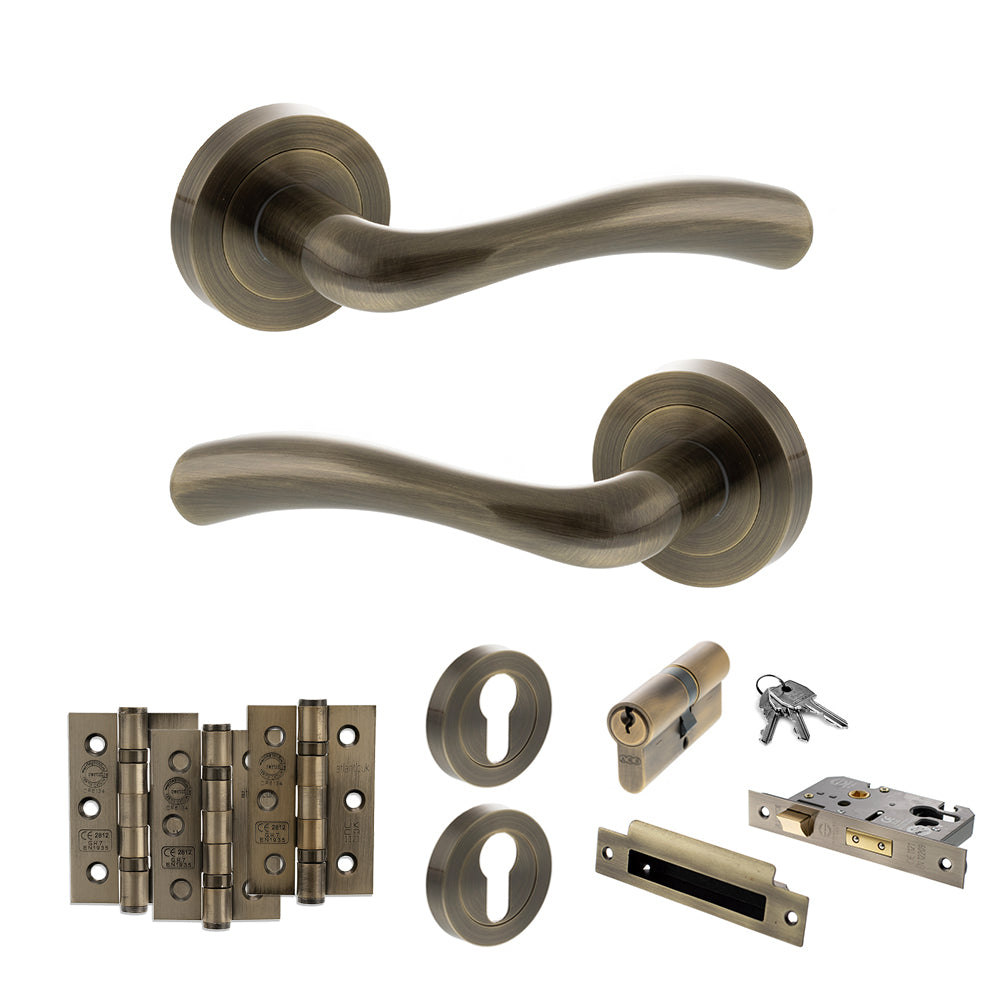 Quality image of STATUS Texas Door Handle Pack (Euro Lock Set - 3" CE Sashlock, 3" Fire Rated Hinges x3) - Antique Brass | Sku. adps35rab21 | available from Trade Door Handles.