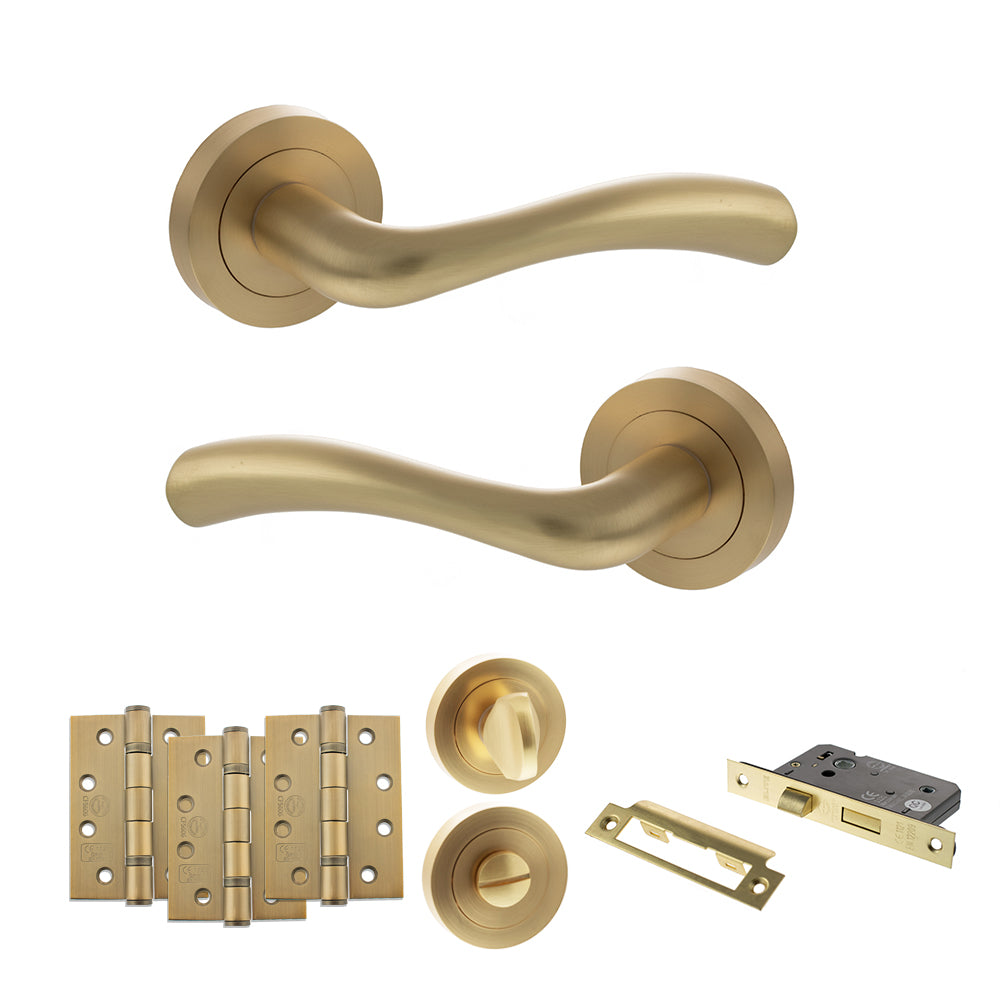 Quality image of STATUS Texas Door Handle Pack (Bathroom Set - 3" CE Bathroom Lock, 4" Fire Rated Hinges x3) - Satin Brass | Sku. adps35rsb11 | available from Trade Door Handles.
