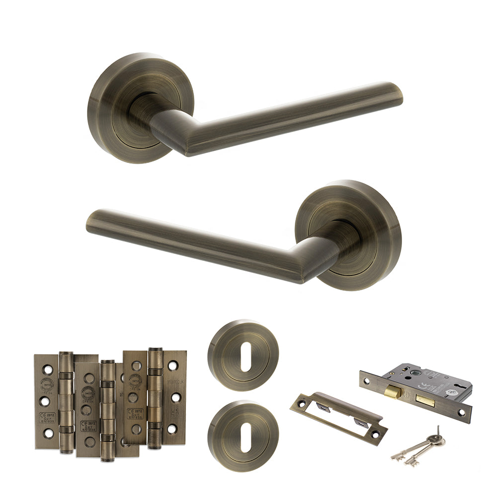 Quality image of STATUS Alabama Door Handle Pack (3 Lever Lock Set - 3" CE Sashlock, 3" Fire Rated Hinges x3) - Antique Brass | Sku. adps43rab15 | available from Trade Door Handles.