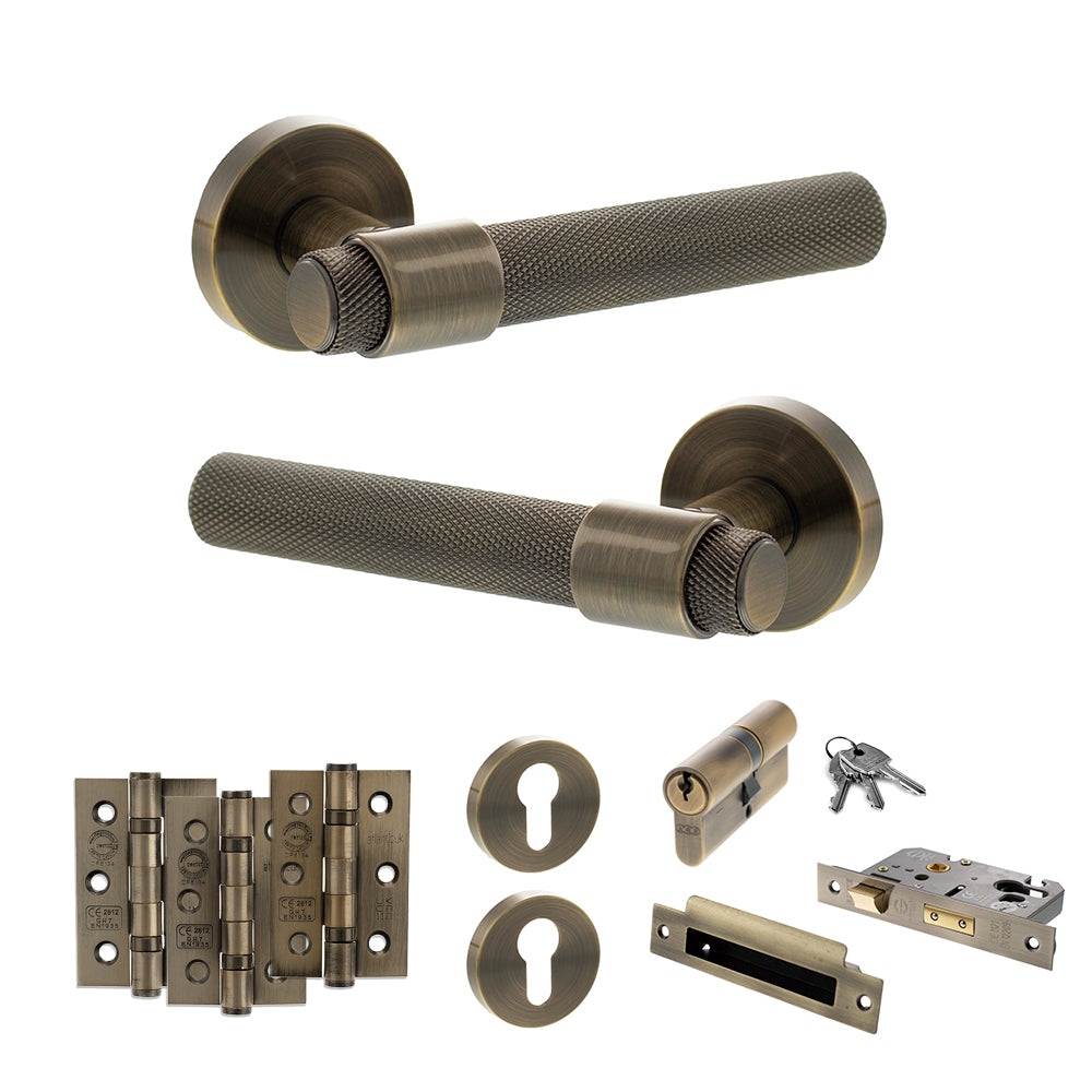 Quality image of Senza Pari Andretta Door Handle Pack (Euro Lock Set - 3" CE Sashlock, 3" Fire Rated Hinges x3) - Antique Brass | Sku. adpspr160ab21 | available from Trade Door Handles.