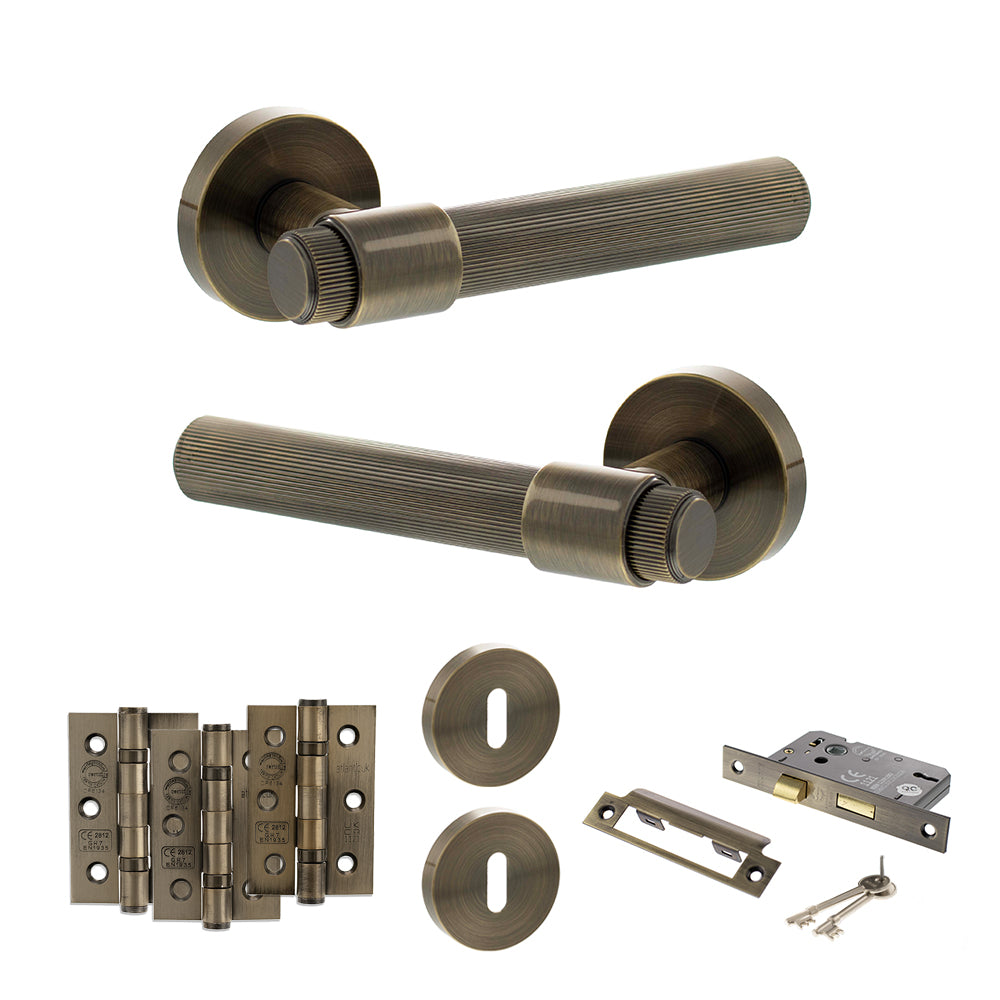 Quality image of Senza Pari Fasana Door Handle Pack (3 Lever Lock Set - 2.5" CE Sashlock, 3" Fire Rated Hinges x3) - Antique Brass | Sku. adpspr165ab14 | available from Trade Door Handles.
