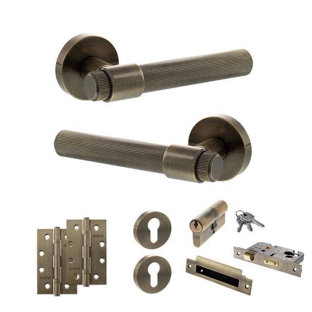 Quality image of Senza Pari Fasana Door Handle Pack (Euro Lock Set - 2.5" CE Sashlock, 4" Slim Knuckle Hinges x2) - Antique Brass | Sku. adpspr165ab24 | available from Trade Door Handles.