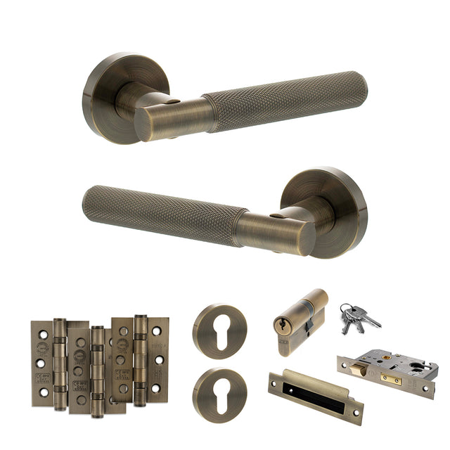 Quality image of Senza Pari Rosarno Door Handle Pack (Euro Lock Set - 3" CE Sashlock, 3" Fire Rated Hinges x3) - Antique Brass | Sku. adpspr170ab21 | available from Trade Door Handles.