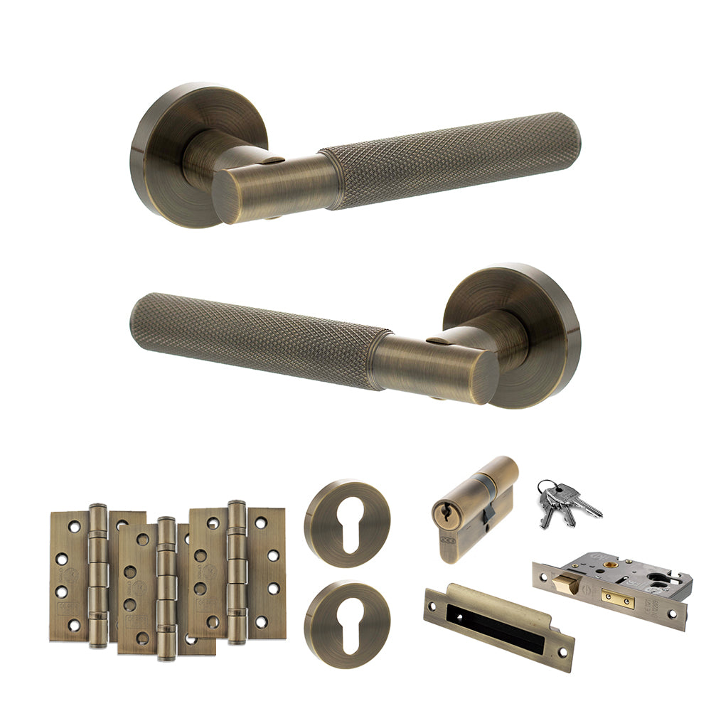 Quality image of Senza Pari Rosarno Door Handle Pack (Euro Lock Set - 3" CE Sashlock, 4" Fire Rated Hinges x3) - Antique Brass | Sku. adpspr170ab23 | available from Trade Door Handles.