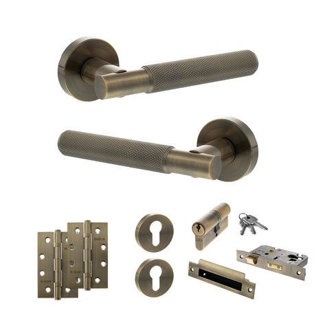 Quality image of Senza Pari Rosarno Door Handle Pack (Euro Lock Set - 3" CE Sashlock, 4" Slim Knuckle Hinges x2) - Antique Brass | Sku. adpspr170ab25 | available from Trade Door Handles.