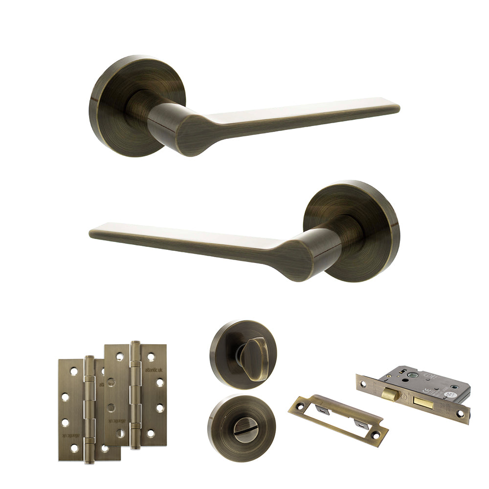 Quality image of Senza Pari Laviano Door Handle Pack (Bathroom Set - 2.5" CE Bathroom Lock, 4" Slim Knuckle Hinges x2) - Antique Brass | Sku. adpspr180ab12 | available from Trade Door Handles.