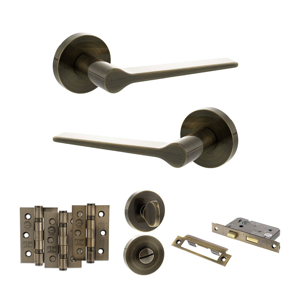 Quality image of Senza Pari Laviano Door Handle Pack (Bathroom Set - 2.5" CE Bathroom Lock, 3" Fire Rated Hinges x3) - Antique Brass | Sku. adpspr180ab8 | available from Trade Door Handles.